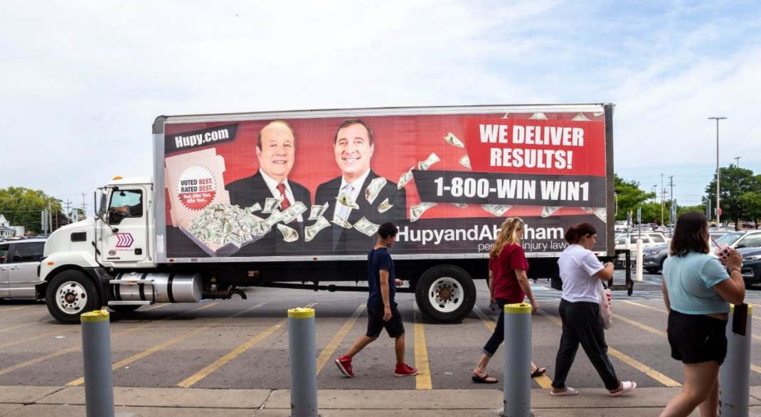 Hupy and Abraham We Deliver Results mobile billboard
